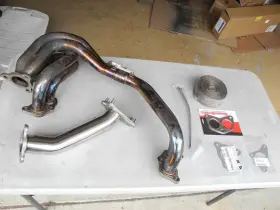 Tr-es1000 Tomioka Uel Exhaust Header Fits 02-21 Subaru Wrx Sti Etc. With Ej20 Ej25 - Tomei