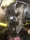 Nissan Exhaust Manifold 14002-EA210 Passenger Side Used. Price: $80.00.