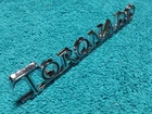 Nos Gm 1971 Toronado Rear Trunk Lid Script Ornament Emblem Oldsmobile New. Price: $34.99.