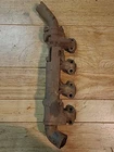 Original Ford Exhaust Manifold D5DE-9430-BC Used. Price: $75.00.