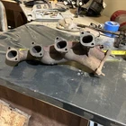 Bmw E10 2002 Tii Coupe Original Cast Iron Exhaust Manifold 12114201801 Used. Price: $299.00.
