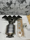 16472 Catalytic Converter Manifold For Kia Soul Spectra Hyundai Elantra 2.0L New. Price: $65.00.