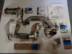 Ford Manifold And Gasket Kit F6RZ9K494AD ( DN5148 DS1228) New. Price: $1100.00.