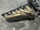 Left Exhaust Manifold Oem 08-14 Dodge Challenge 1YR Wrnty Used. Price: $125.00.