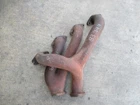 1983-1985 Porsche Engine Exhaust Manifolds 9441111312R & 9441111332R Oem Used. Price: $195.00.