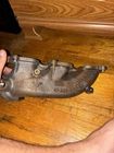 Oem Ford Exhaust Manifold JL3E-9430-EN Fomoco Cast Iron Used. Price: $60.00.