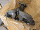 New Oem Mopar Exhaust Manifold 05080860AA. Price: $189.95.