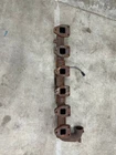 7098611C3 Genuine International Exhaust Manifold Assembly Used. Price: $289.00.