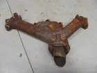 348 W Engine Exhaust Manifold 1958 3732793 Lh Impala Used. Price: $85.00.