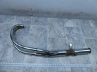 1975 Honda CB550F Four H189-3. Left Exhaust Headers And Modified Muffler Pipe Used. Price: $41.60.