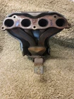2004 - 2008 Acura Tsx 2.4L Exhaust Manifold Header W/ Shield Assembly Oem Used. Price: $100.00.