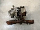 2012-2014 Volkswagen Passat 2.0L Exhaust Manifold With Turbocharger Used. Price: $849.99.