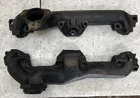 1977-80 Pontiac 301 V-8 Exhaust Manifolds #526030 & #526707-8 Used. Price: $170.00.