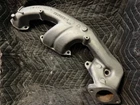 Exhaust Manifold Remanufactured. Price: $290.00.