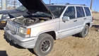 1993-1998 Jeep Grand Cherokee Driver Left Exhaust Manifold Assembly 5.2L At 4X4 Used. Price: $124.69.