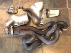 2008-2013 Bmw M3 Left Exhaust Manifold With Heat Shields 11627840478 Oem Used. Price: $175.00.