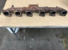 Mack E7 Exhaust Manifold - Used. Price: $315.00.